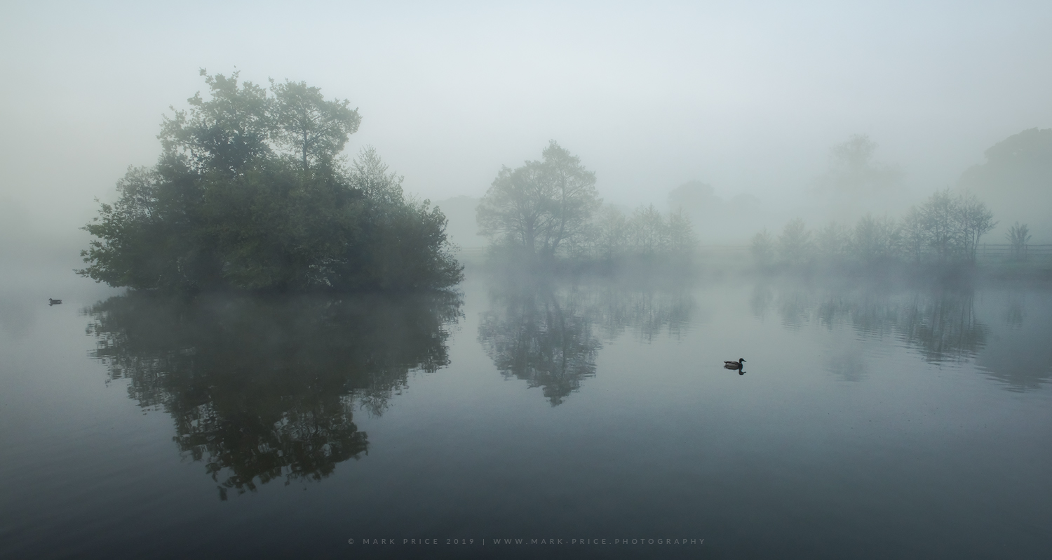 Landscape photograph by Mark Price of Early morning at a lake in Sussex