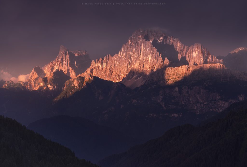 Intense evening light striking Mt Civetta in Italy