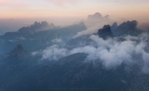 Late afternoon low cloud over the peaks of the Cortina region, Italy