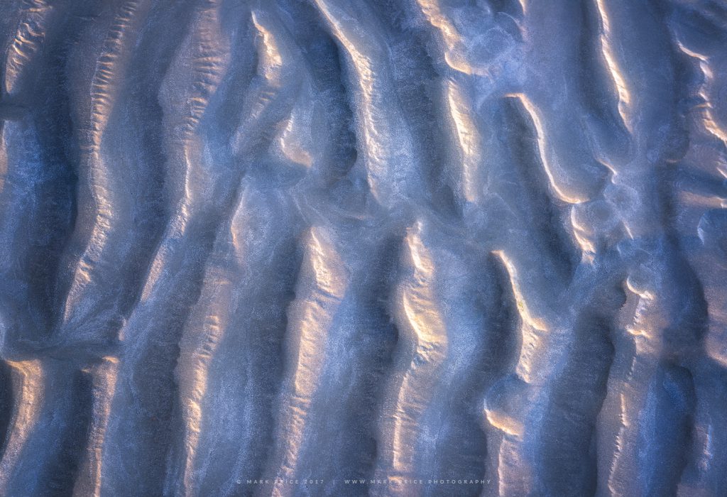 Sand patterns on a Sussex beach at sunrise