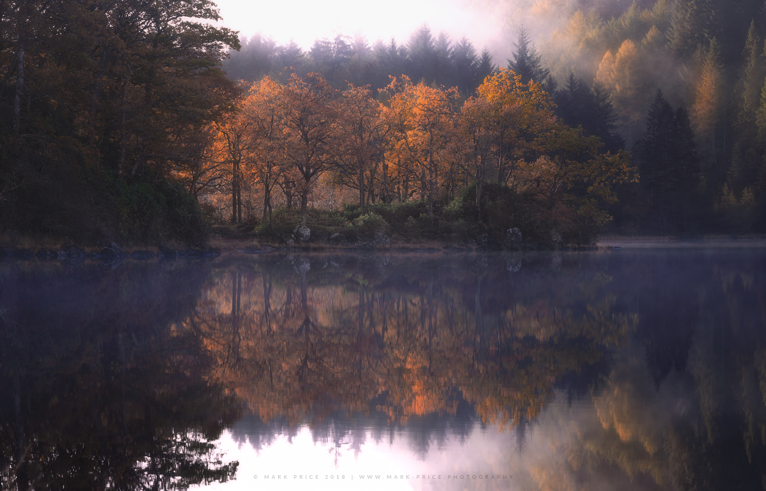 Autumn in full flow at a quiet Scottish loch