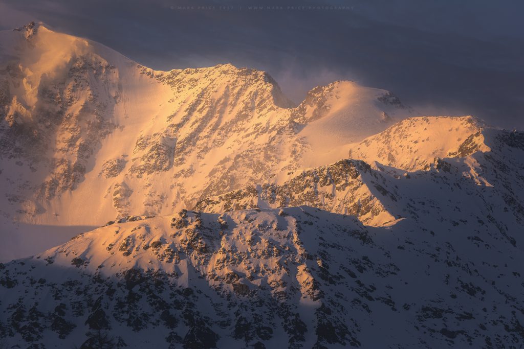 Early morning light casting across a wintery ridge