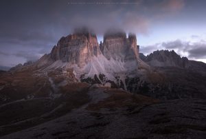 Tre Cime's south face illuminated by the first light of the day, Italy