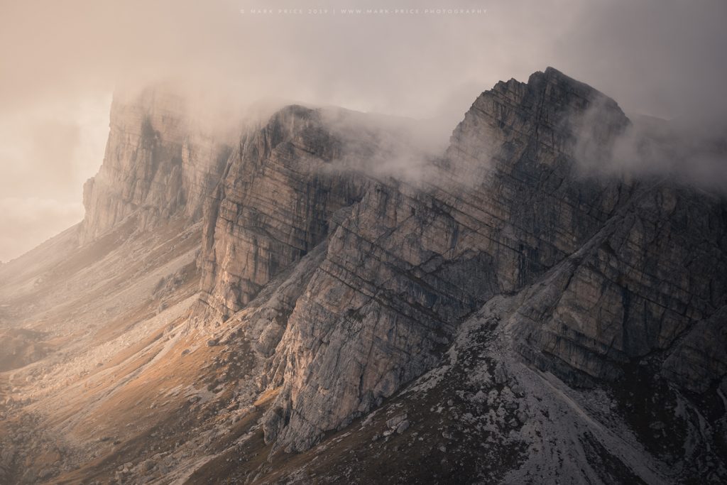 A trio of huge peaks catch dynamic sidelight, Dolomites