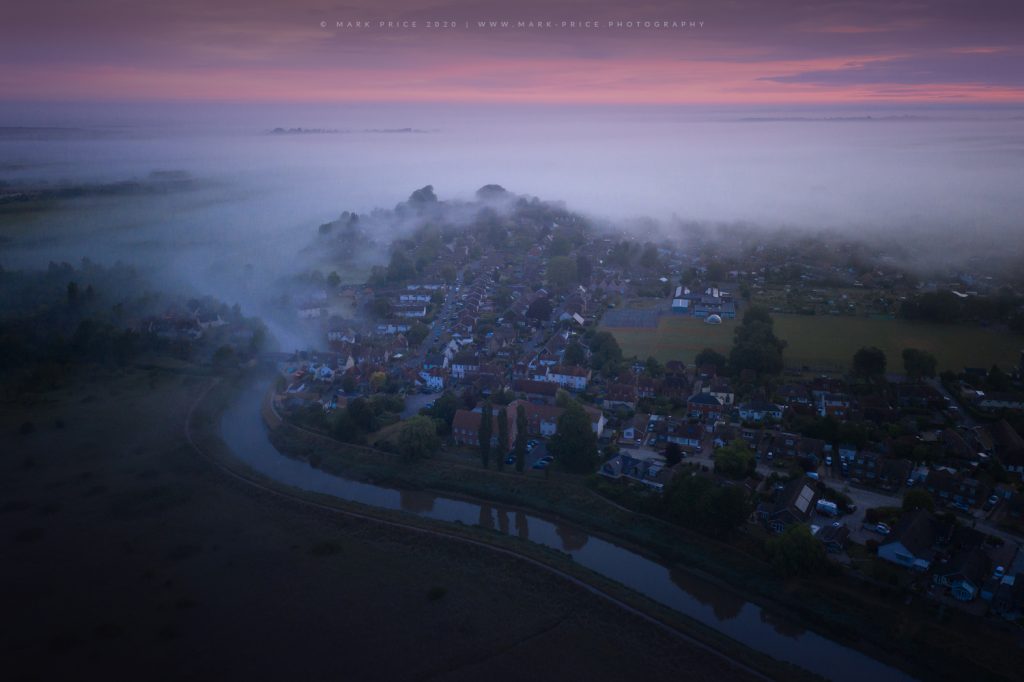 An early summer morning over Bramber in the mist, West Sussex