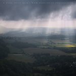 A panoramic view of dynamic light across Devil's Dyke, Sussex