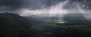 A panoramic view of dynamic light across Devil's Dyke, Sussex