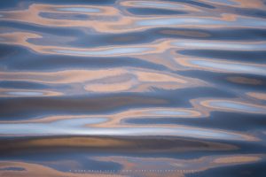 A photograph of Beautiful abstract patterns in the river at Cuckmere Haven, Sussex