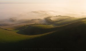 Magnificent fog and light across the rolling hills of the South Downs, Sussex