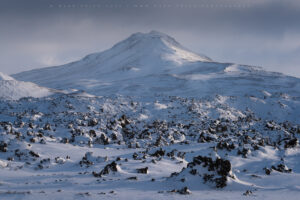 Huge snow covered lava fields surrounds this peak in West Iceland