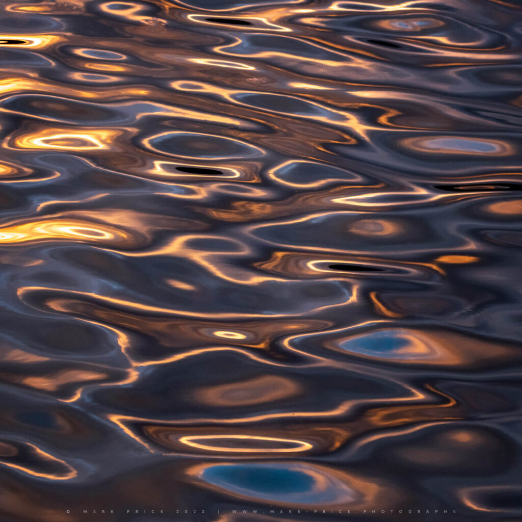 Wild water patterns during a colourful autumn sunset