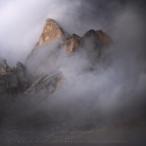 Dynamic low cloud surrounding the peaks of Northern Italy