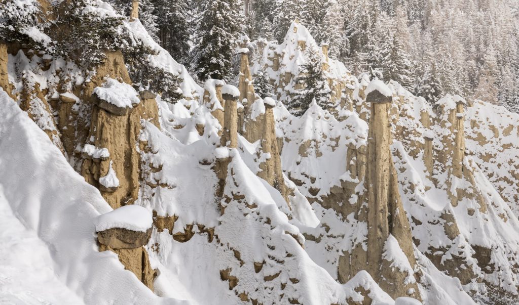 Earth Pyramids - a geological oddity - in the Dolomites in fresh snowfall