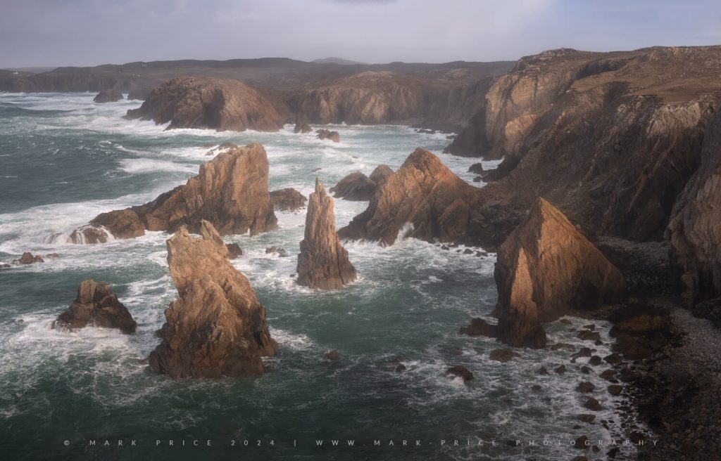 First light hitting a wild section of coast on Lewis - Image by Mark Price Landscape Photography