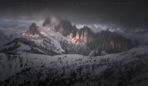 Last light striking the imposing peaks of the Dolomites in the peak of winter..