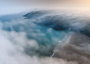 Rolling sea fog across a Cornish bay, June 2026